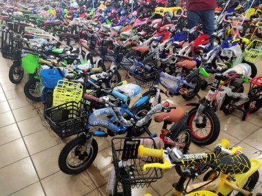NILAI, MALAYSIA -MARCH 5, 2020: Various types of bikes are on display in the store. Kids bike to an adult bike.