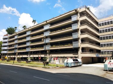 KUALA LUMPUR, MALAYSIA -MARCH 16, 2020: Elevated car park building for public used. Designed using the natural ventilation with the flower planter box at the facade. 