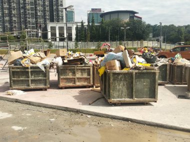 KUALA LUMPUR, MALAYSIA -MARCH 3, 2020: Huge wasted disposal bin used to collect rubbish and unused material from the construction site. Has a fixed collection schedule