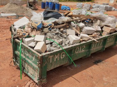 KUALA LUMPUR, MALAYSIA -MARCH 3, 2020: Huge wasted disposal bin used to collect rubbish and unused material from the construction site. Has a fixed collection schedule