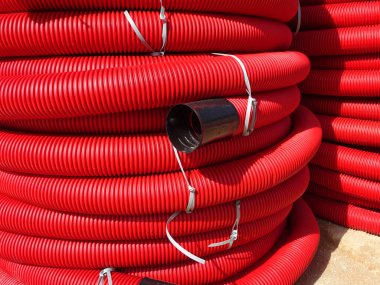 KUALA LUMPUR, MALAYSIA -FEBRUARY 6, 2019: HDPE corrugated pipe with double-wall strength at the construction site. Used to protect underground cable. 