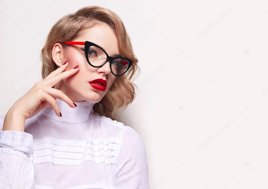 A girl in retro glasses.