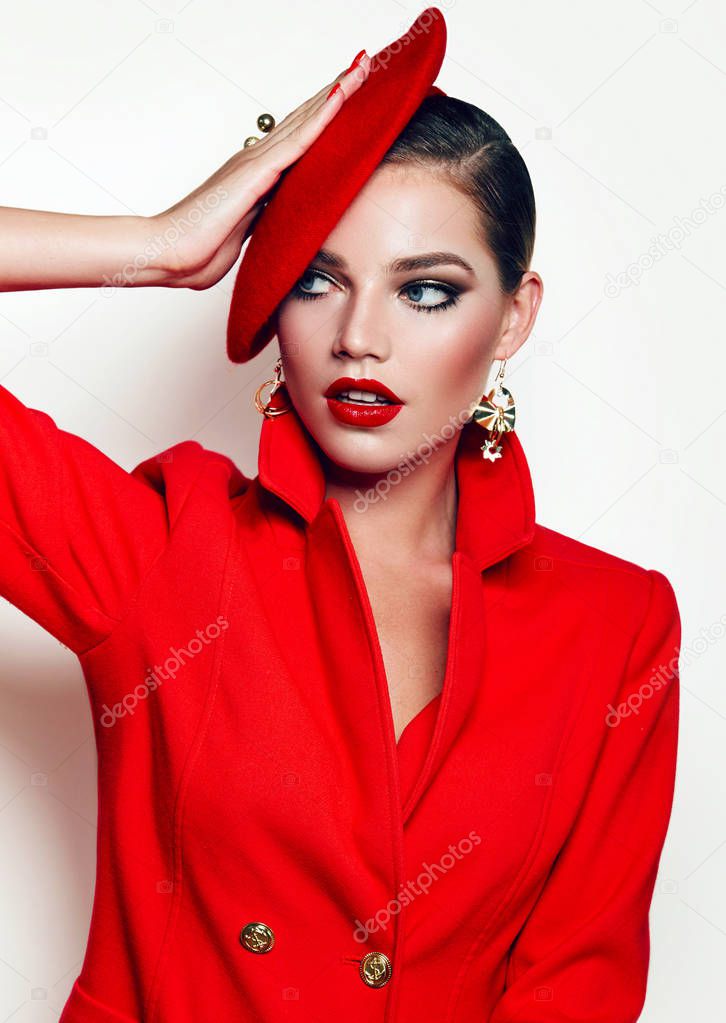 Beautiful young girl in a red jacket and a red beret.fashion, beauty, clothing, hats, makeup, accessories, make-up artist, boutique, beauty salon.