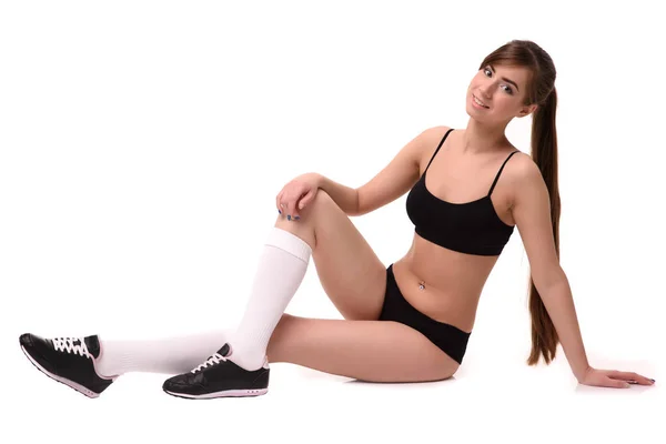 Bella donna fitness in biancheria intima nera. su sfondo bianco — Foto Stock