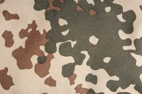 Military texture camouflage background close-up