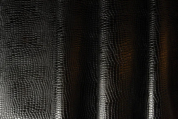 Ciemna skóra tekstura tło zbliżenie makro — Zdjęcie stockowe
