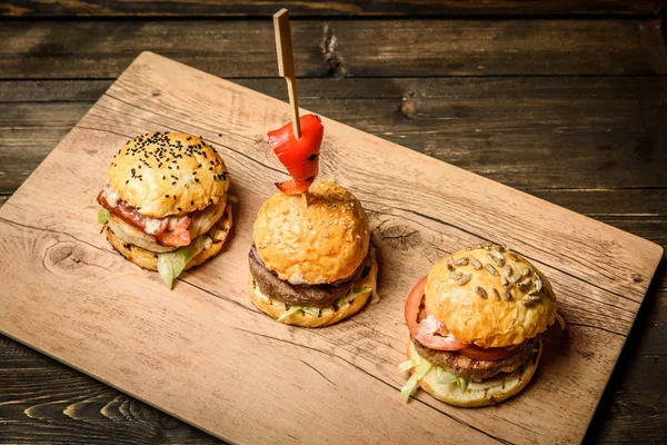 Tres hamburguesas pequeñas — Foto de Stock