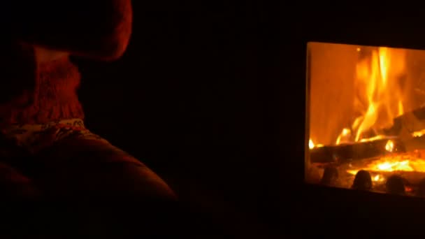 Woman Sitting near Stove — Stock Video