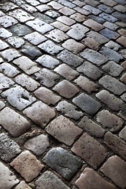 Fransız bir sokakta bir eski cobblestones arka plan yakın çekim