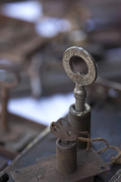 Old key in a flea market — Stock Photo, Image