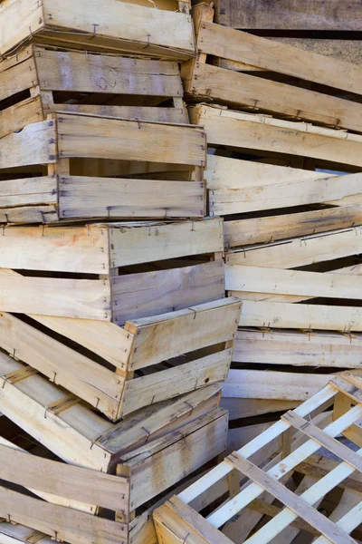 Piles of wooden crates in a market — Stock Photo, Image