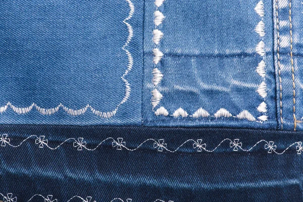 Textura de denim com diferentes padrões de linha branca — Fotografia de Stock