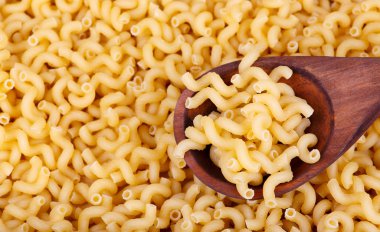 Tahta kaşık ile makarna arka plan