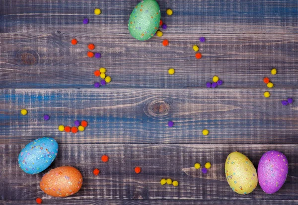 Easter eggs on a wooden background — Stock Photo, Image