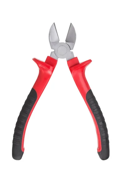 白い背景に隔離されたゴム製の赤いハンドルを持つ開いた斜めのペンチ — ストック写真