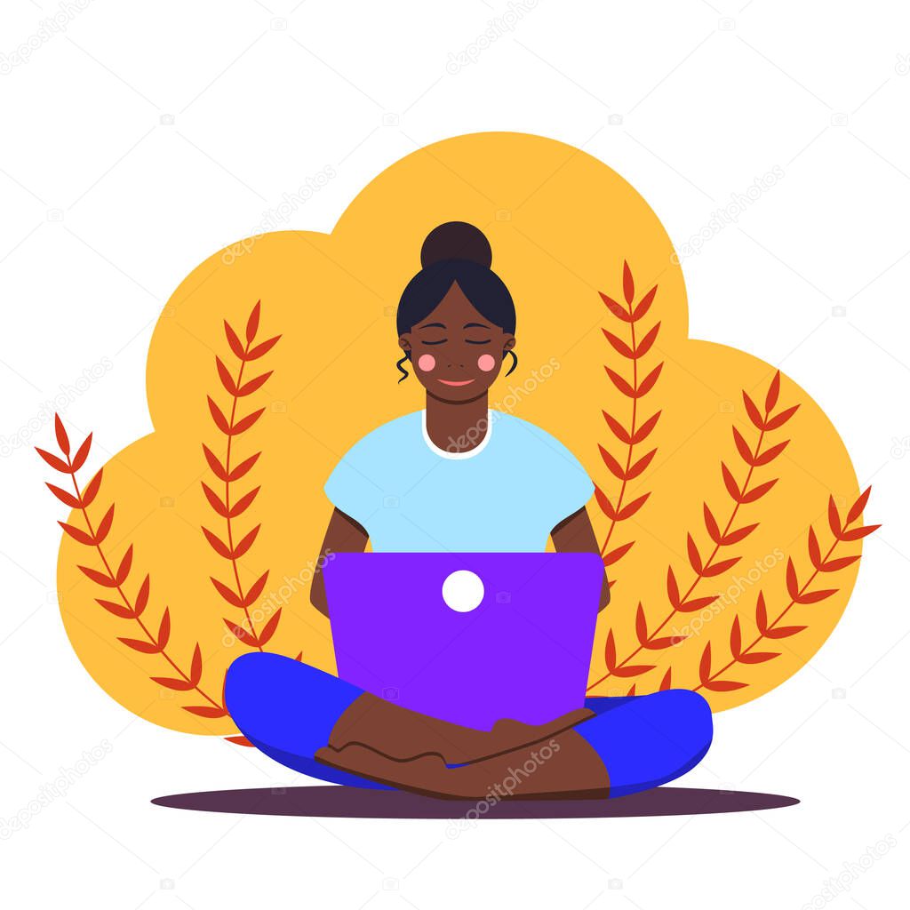 African girl sitting with laptop in lotus position. Young woman working on the notebook, studying, browsing internet, chatting, blogging. Online education or freelance. Stay home. Social distancing