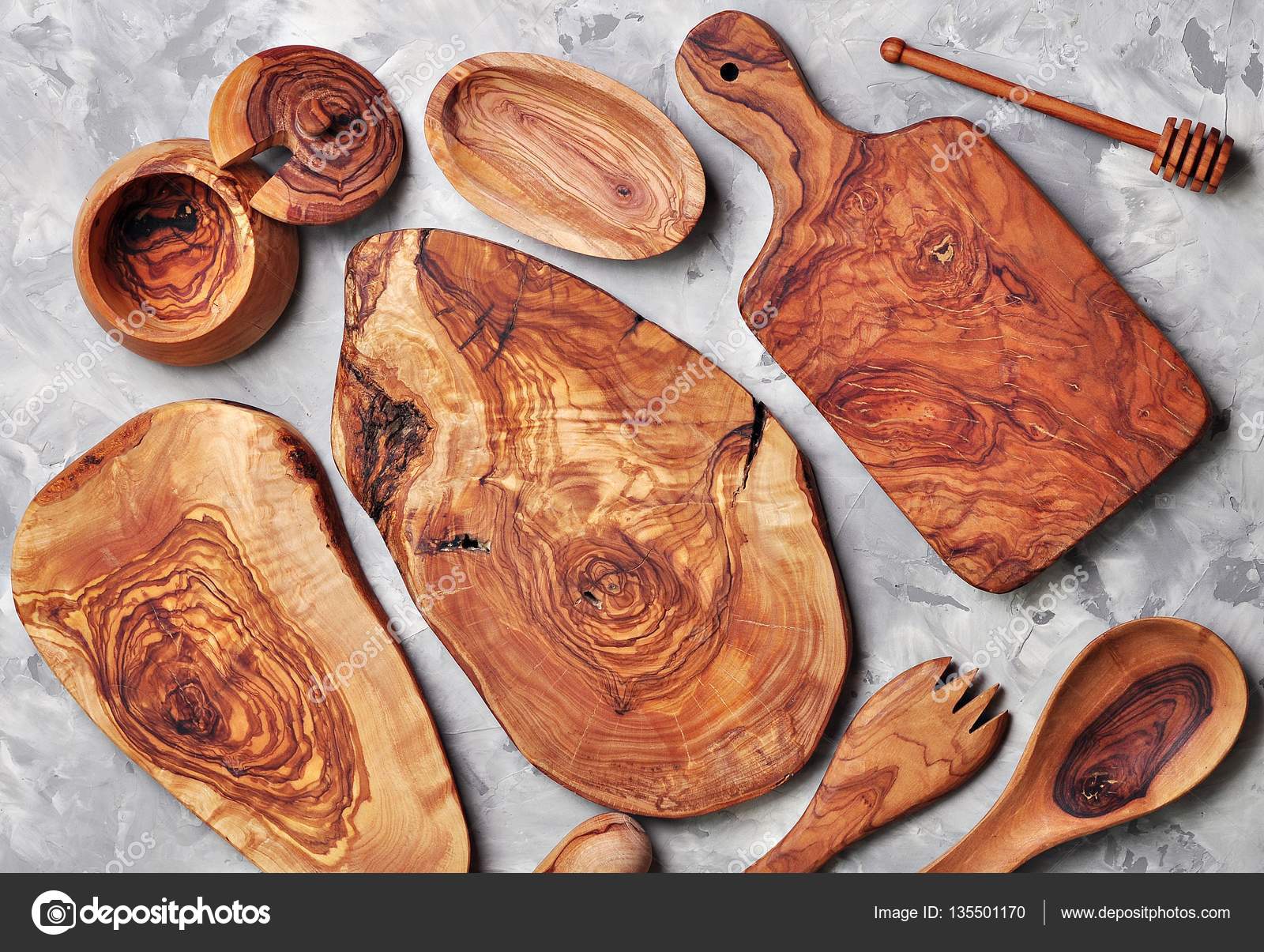 Various kitchen utensils made of olive wood cutting boards, fork