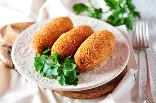 Chicken Kiev cutlets with parsley leaves. Ukrainian tradition food. — Stock Photo, Image