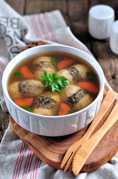 Jellied stuffed fish on the old wooden background. — Stock Image Jellied stuffed fish on the old wooden background. Stock Picture