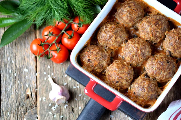 Beef meat balls with rice baked in tomato sauce. — Stock Photo, Image