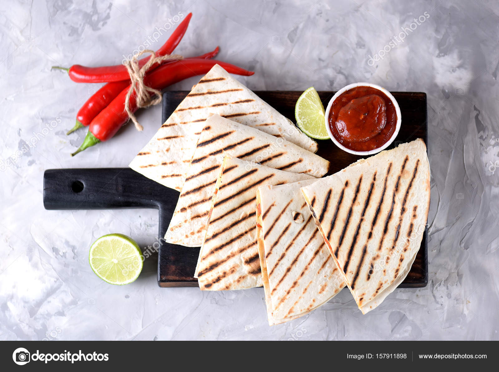 Mexican tortilla grill with chicken, avocado, onion, mushrooms, red