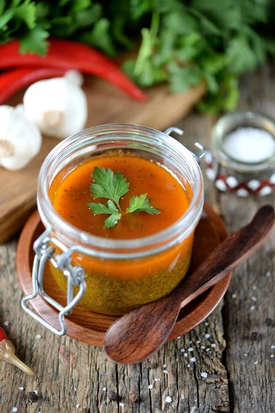 Traditional sauce for meat or fish from cilantro, parsley, chili, garlic, onion, cumin, coriander seeds with olive oil and lemon juice. Middle Eastern cuisine. — Stock Photo, Image