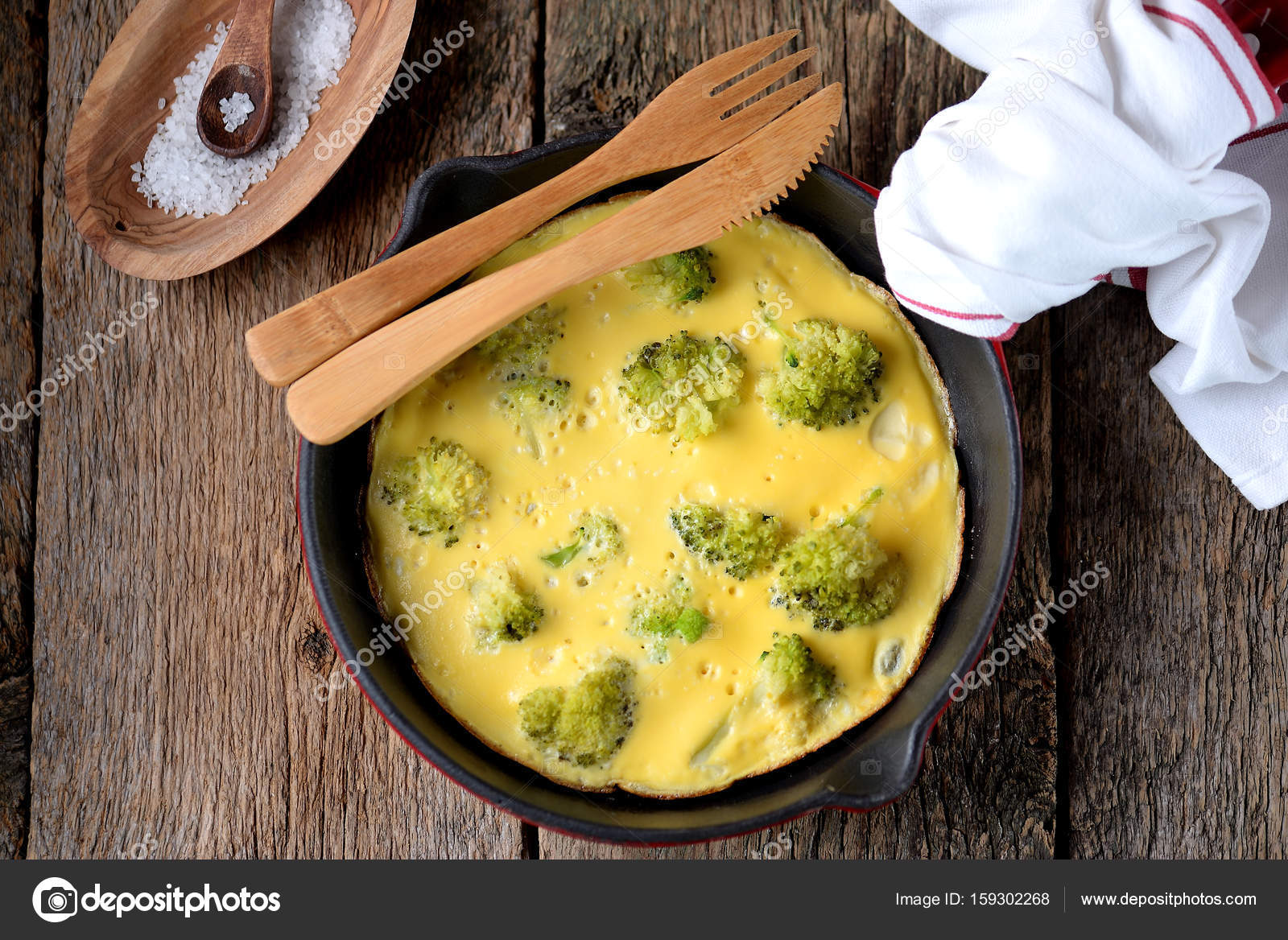 Omelette with broccoli in a castiron frying pan, healthy breakfast