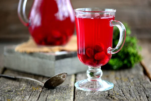 Homemade compote (drink) made from cornel organics with honey. Healthy drink. — Stock Photo, Image