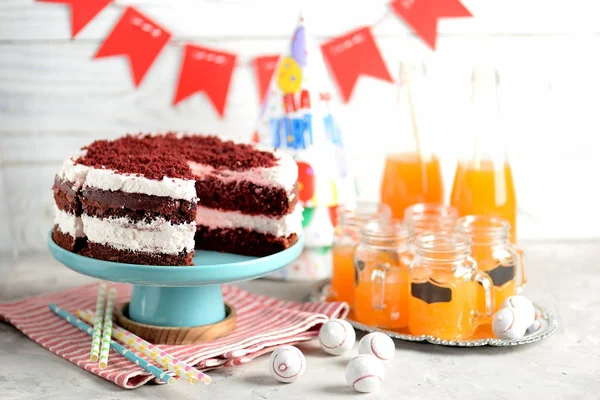 Homemade cake Red Velvet on a wooden background. Birthday party.