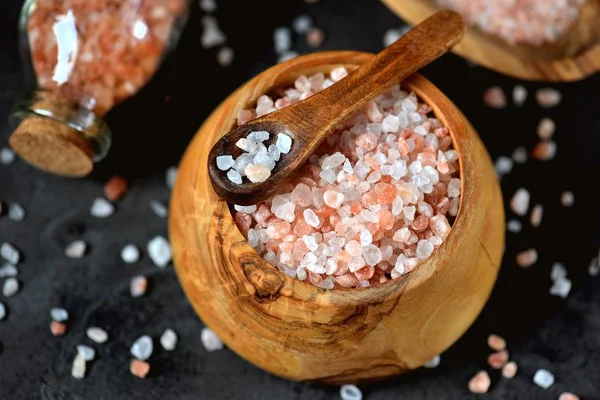 Himalayan large pink salt in a bowl of olive tree.