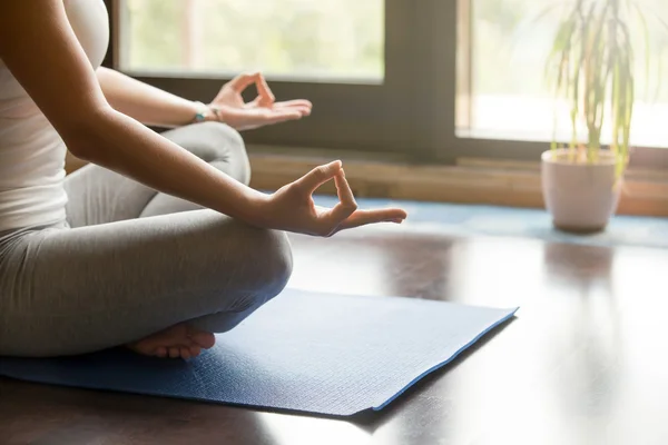 Yoga at home: meditating close-up — Stock Photo, Image