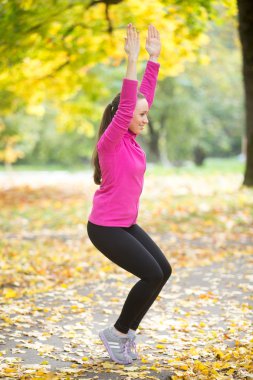 Yoga outdoors: Utkatasana posture