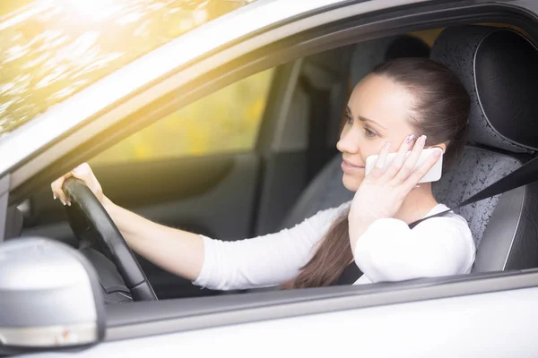 Close up of female hands hold on steering wheel — Stock Photo, Image