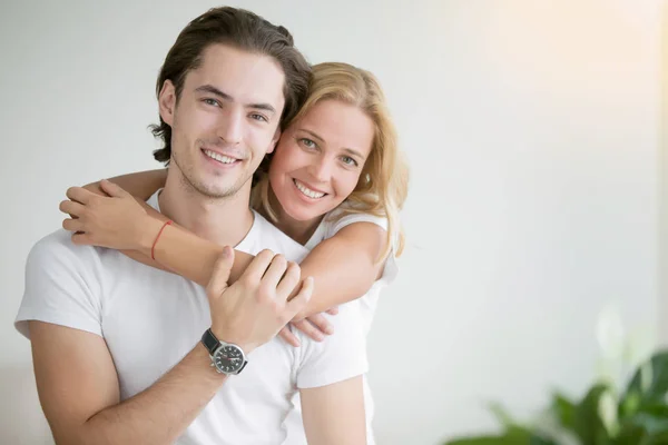 Young smiling man and woman
