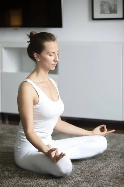 Portrait of an attractive woman at Lotus Pose — Stock Photo, Image