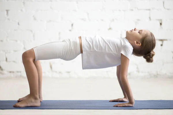 Girl child in Reverse Table Top pose, white studio background — Stock Image Girl child in Reverse Table Top pose, white studio background Stock Picture