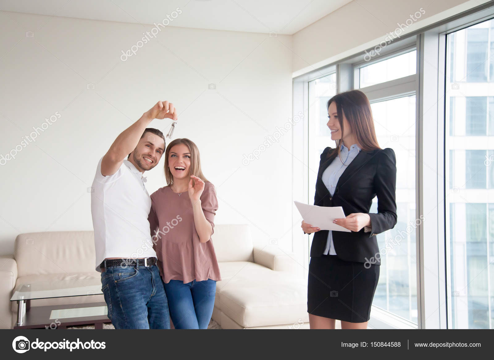 Getting Keys After Buying Apartment Couple And Real Estate Agen Stock Photo Getting Keys After Buying Apartment Couple And Real Estate Agen Stock Photo