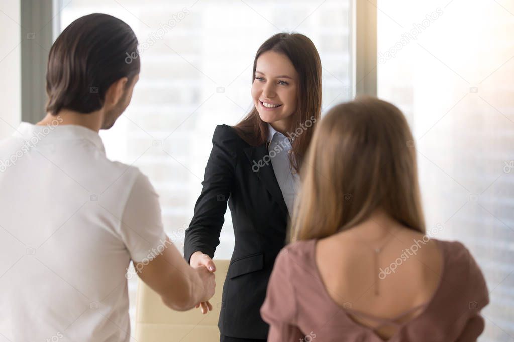 Business people shaking hands, greeting handshake with clients a