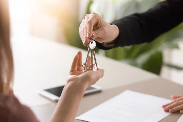 Woman getting keys to new rented own apartment, close up — Stock Photo, Image
