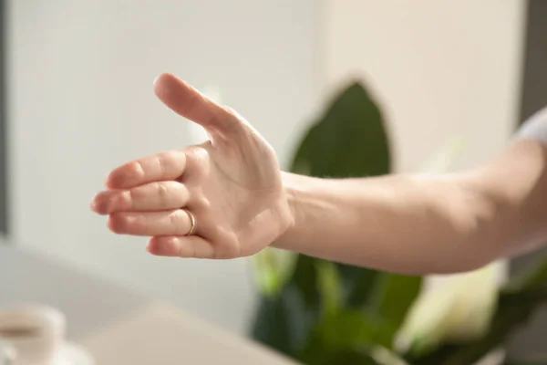 Image of reached out for handshake womans hand — Stock Photo, Image