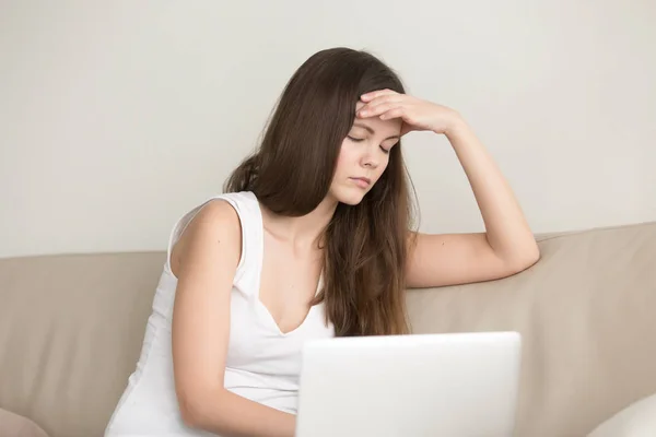 Lady suffering from headache after work on laptop — Stock Photo, Image