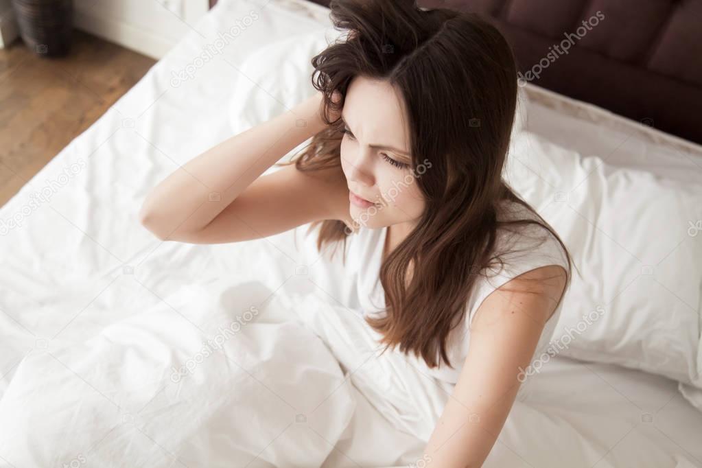 Female feeling exhausted after sleepless night