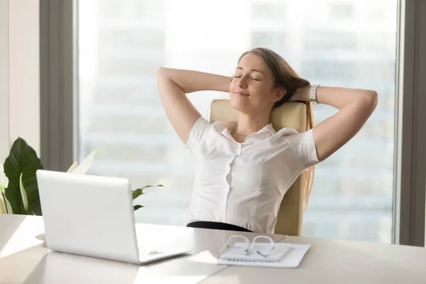 Calm smiling businesswoman relaxing at comfortable chair hands b — Stock Photo, Image