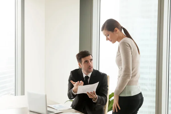 Mean furious boss reprimands incompetent female employee for bad — Stock Photo, Image