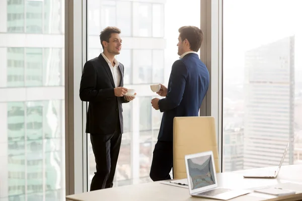 Business partners taking coffee break on meeting — Stock Photo, Image