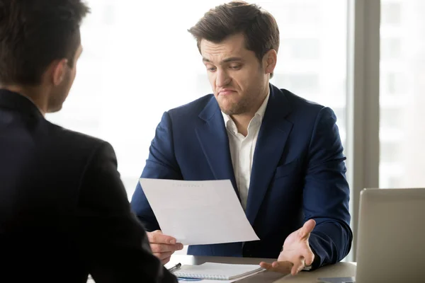 Businessman disappointed with partners offer