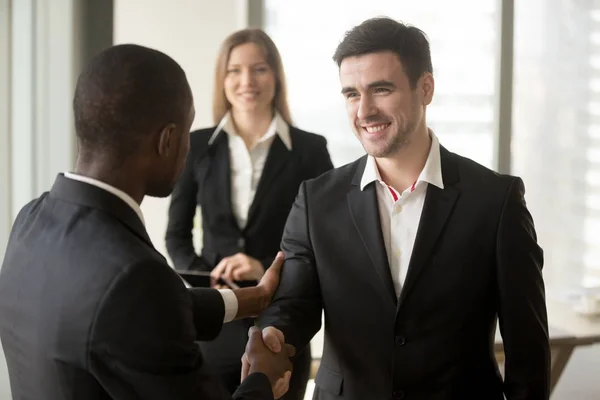 Boss welcoming and thanking employee for good job