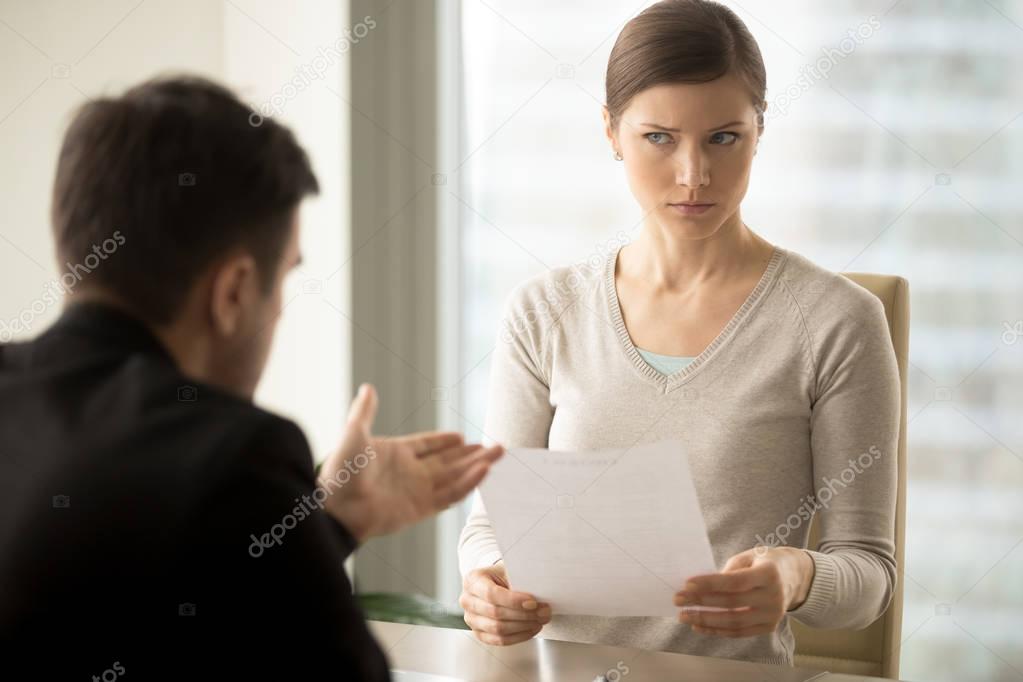 Manager trying to convince doubtful female client