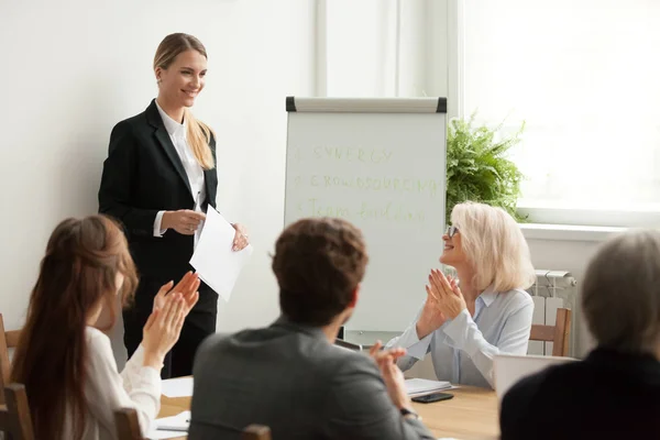 Executive team congratulating successful female manager with app — Stock Photo, Image