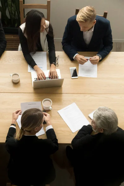 Diverse business colleagues working together at meeting, vertica — Stock Photo, Image